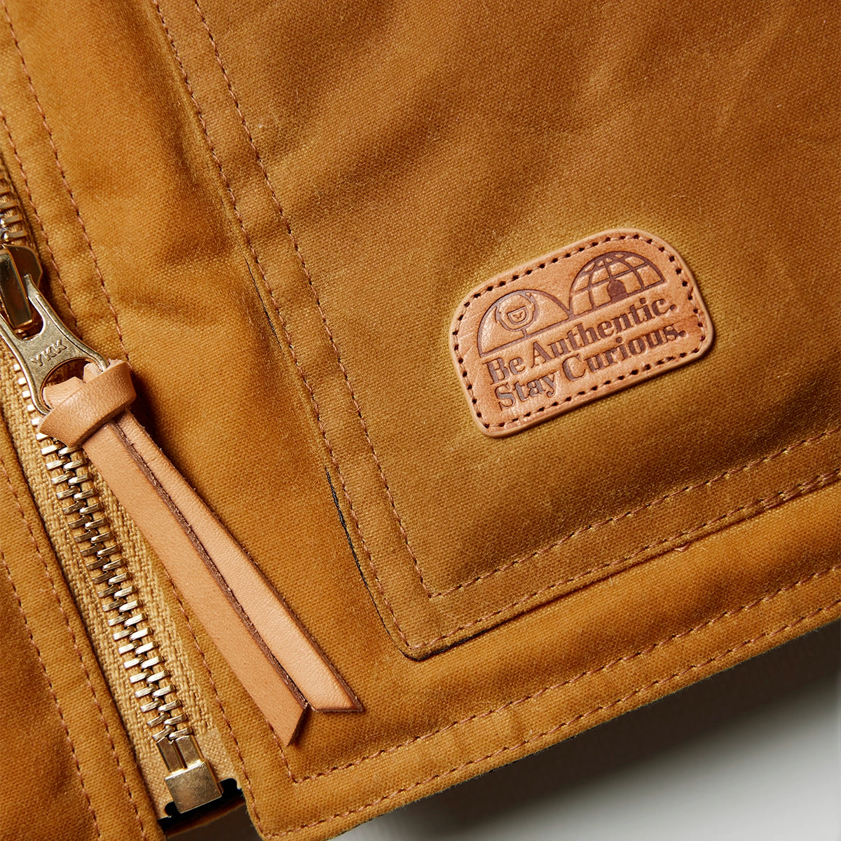 waxed canvas vest leather detail