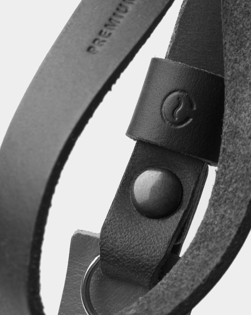 leather wrist camera strap black and white logo detail
