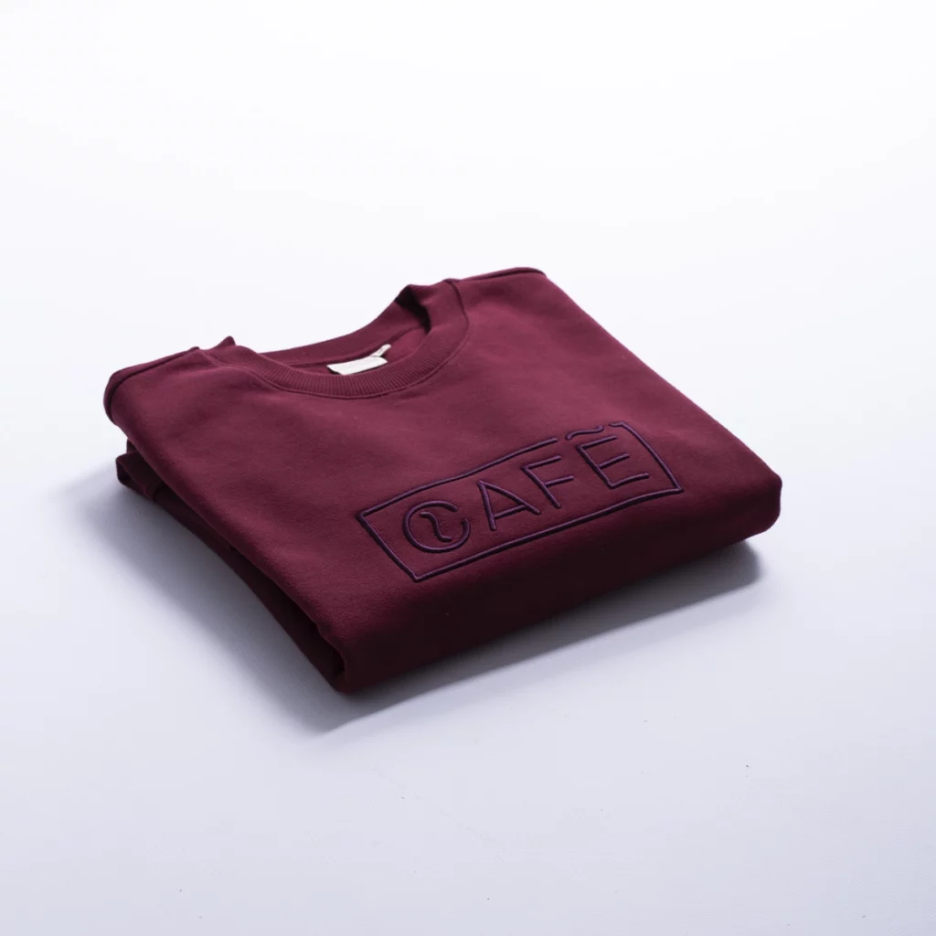 The Café Logo Embroidery Sweater in Burgundy